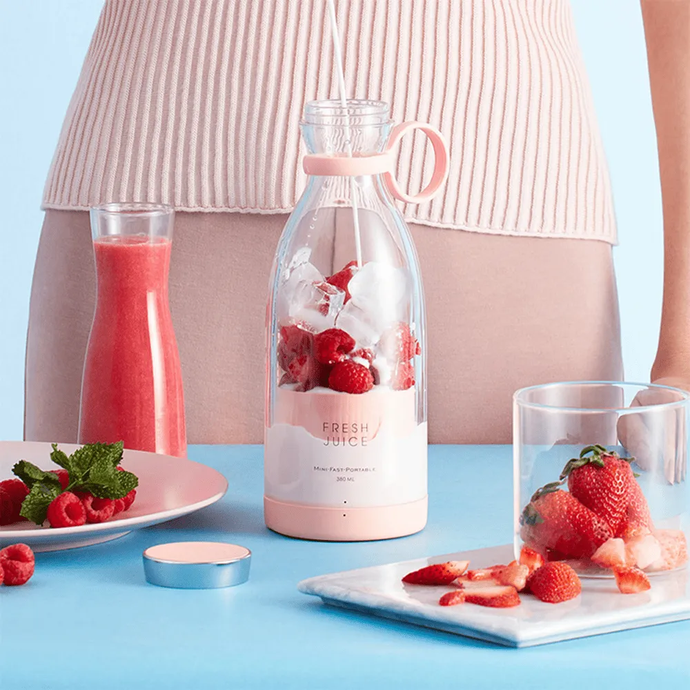 Presse agrume portable Fresh Juice idéal pour mixer citron, orange et fruits.
